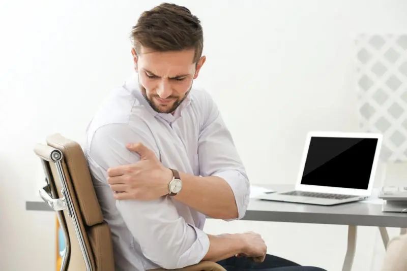 man with shoulder pain