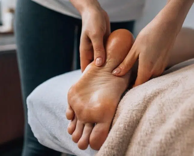 close up picture of chiropractic foot adjustment